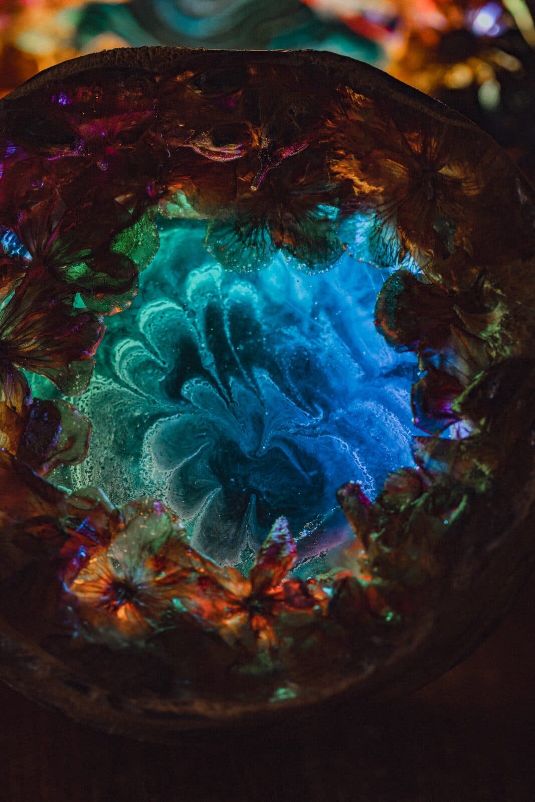 Glowing close-up of an Eluztres lamp in the dark